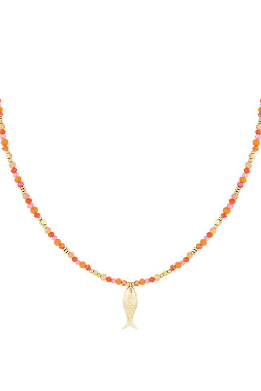 Gold-plated fish charm beaded necklace on white background 